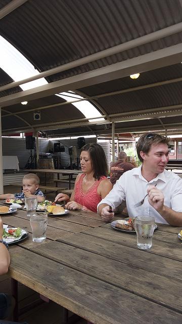 A family enjoys an assortment of food at the Ayers Rock Resort